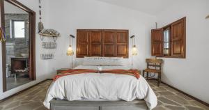 Postel nebo postele na pokoji v ubytování Cuadra Casona el Calvario