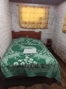 Postel nebo postele na pokoji v ubytování Hostal La Rosita + 10 fotografií