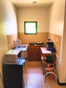 Una cocina o cocineta en Casa NAU Mazunte