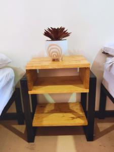 Una cama o camas en una habitación de Casa NAU Mazunte