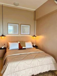 Ένα ή περισσότερα κρεβάτια σε δωμάτιο στο AEON TOWER STUDIO by The 8Flats