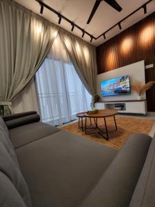 TV a/nebo společenská místnost v ubytování Youth City Residence Nilai
