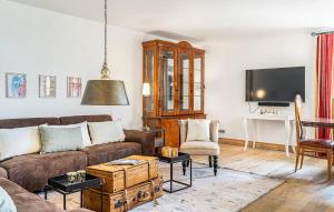 Uma TV ou centro de entretenimento em Ferienhaus Am Katschberg