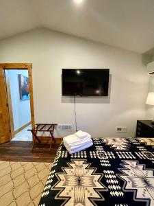 TV a/nebo společenská místnost v ubytování Mountain View Suite