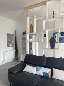 Posezení v ubytování Maison "Au fil de l'eau"