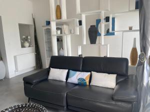 Posezení v ubytování Maison "Au fil de l'eau"