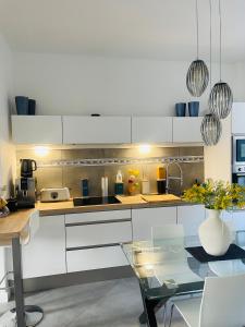 Kuchyň nebo kuchyňský kout v ubytování Maison "Au fil de l'eau"
