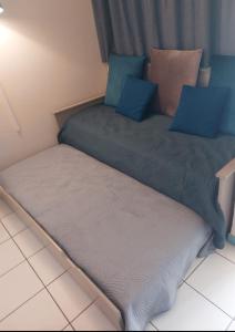 Katil atau katil-katil dalam bilik di T1 BIS RDC Carayou Marina Pointe du Bout