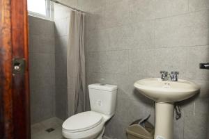 Koupelna v ubytování Hotel Rigobert's