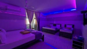 Postel nebo postele na pokoji v ubytování HOTEL PANCHAVARNAA