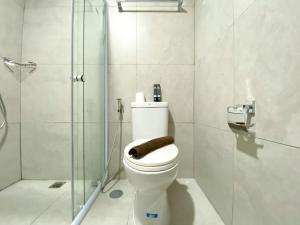 Koupelna v ubytování Minimalist Studio at Pollux Chadstone Apartment By Travelio + 12 fotografií