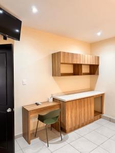 Kuchyň nebo kuchyňský kout v ubytování Hotel Centro Apatzingán