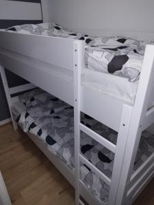 Postel nebo postele na pokoji v ubytování Best apartman