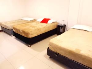 Ένα ή περισσότερα κρεβάτια σε δωμάτιο στο Centro Histórico de Lima, Departamentos Temporales