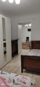 Giường trong phòng chung tại Apartment KARIN