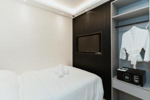 Postel nebo postele na pokoji v ubytování Brilliant Hotel Dan Spa