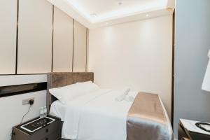 Postel nebo postele na pokoji v ubytování Brilliant Hotel Dan Spa