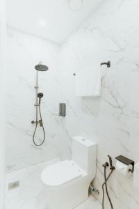 Koupelna v ubytování Brilliant Hotel Dan Spa + 37 fotografií