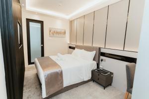 Postel nebo postele na pokoji v ubytování Brilliant Hotel Dan Spa