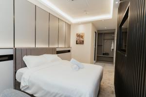 Postel nebo postele na pokoji v ubytování Brilliant Hotel Dan Spa