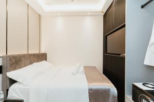 Postel nebo postele na pokoji v ubytování Brilliant Hotel Dan Spa