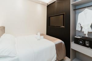 Postel nebo postele na pokoji v ubytování Brilliant Hotel Dan Spa
