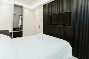Postel nebo postele na pokoji v ubytování Brilliant Hotel Dan Spa