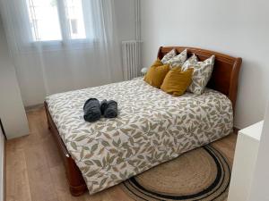 Postel nebo postele na pokoji v ubytování H'Nkou