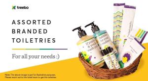 a basket filled withentedailed toothbrushes and toothpaste at Itsy Hotels Sri Sai Grand Inn in Vijayawāda