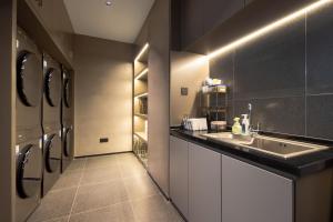 Una cocina o zona de cocina en Atour Light Hotel Shenyang Yuhong Plaza Metro Station