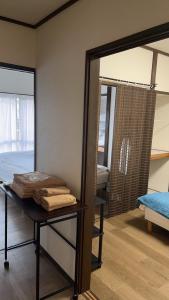 Postel nebo postele na pokoji v ubytování 板橋 RCアネックス Rc302