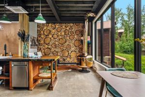 a home office with a wall of windows at Sugar Plum Pines in Gatlinburg