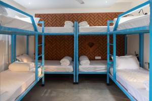 Postel nebo postele na pokoji v ubytování DownTown Hostels - Anjuna