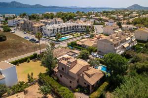 an aerial view of a city with buildings at E415 Can Xisco by Mallorca Villa Selection in Port de Pollensa