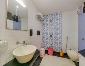 Ένα μπάνιο στο Hotel Vihar Deluxe