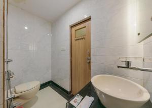 Ένα μπάνιο στο Hotel Vihar Deluxe