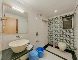 Ένα μπάνιο στο Hotel Vihar Deluxe