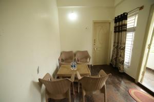 Posezení v ubytování Naksha Tree Hotels - Yelagiri