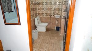 Koupelna v ubytování Radhika Hotel