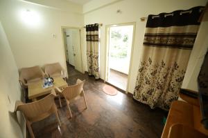 Posezení v ubytování Naksha Tree Hotels - Yelagiri