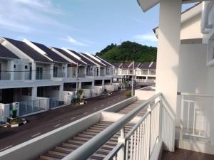 a view of an apartment complex from a balcony at UMMA Homestay Jitra in Jitra