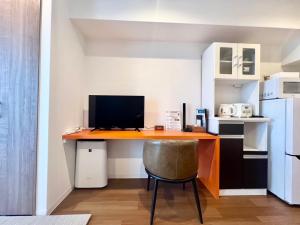 Kuchyň nebo kuchyňský kout v ubytování Apartment Hotel Ecott