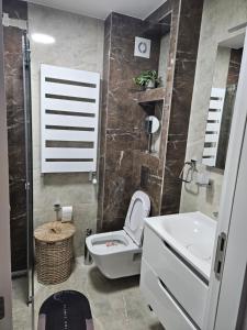 Koupelna v ubytování Apartman Svitanje + 11 fotografií