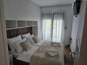 TV a/nebo společenská místnost v ubytování Apartman Svitanje