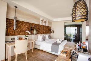 Posezení v ubytování Jimbaran Bay Beach Resort and Spa by Prabhu