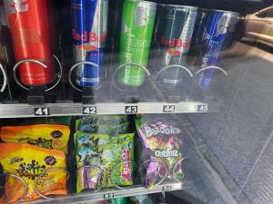 a shelf in a store filled with different types of drinks at modern&renovated - Hotelpension Oberauer Wagrain in Wagrain