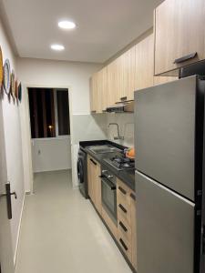 Kuchyň nebo kuchyňský kout v ubytování Appartement de charme à 20 min de Marrakech