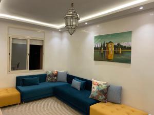 Posezení v ubytování Appartement de charme à 20 min de Marrakech