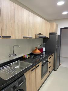 Kuchyň nebo kuchyňský kout v ubytování Appartement de charme à 20 min de Marrakech