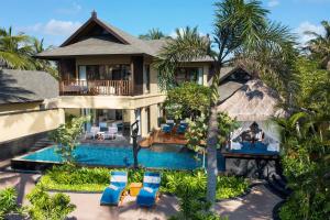 an aerial view of a house with a swimming pool at The St. Regis Bali Resort in Nusa Dua